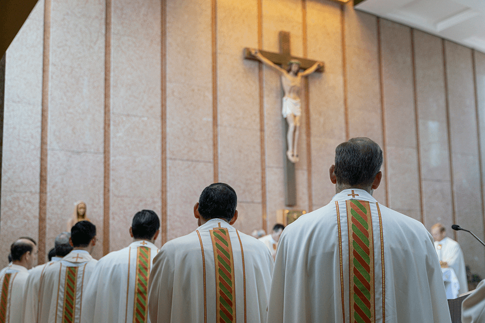 Catholic priests celebrating Mass together